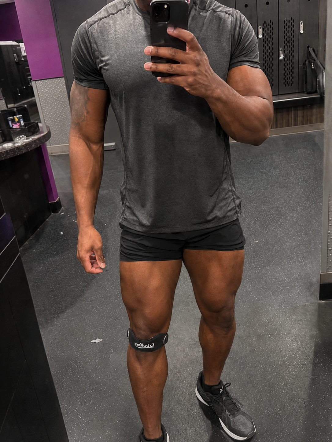 Black ExtraKnee strap worn in the gym