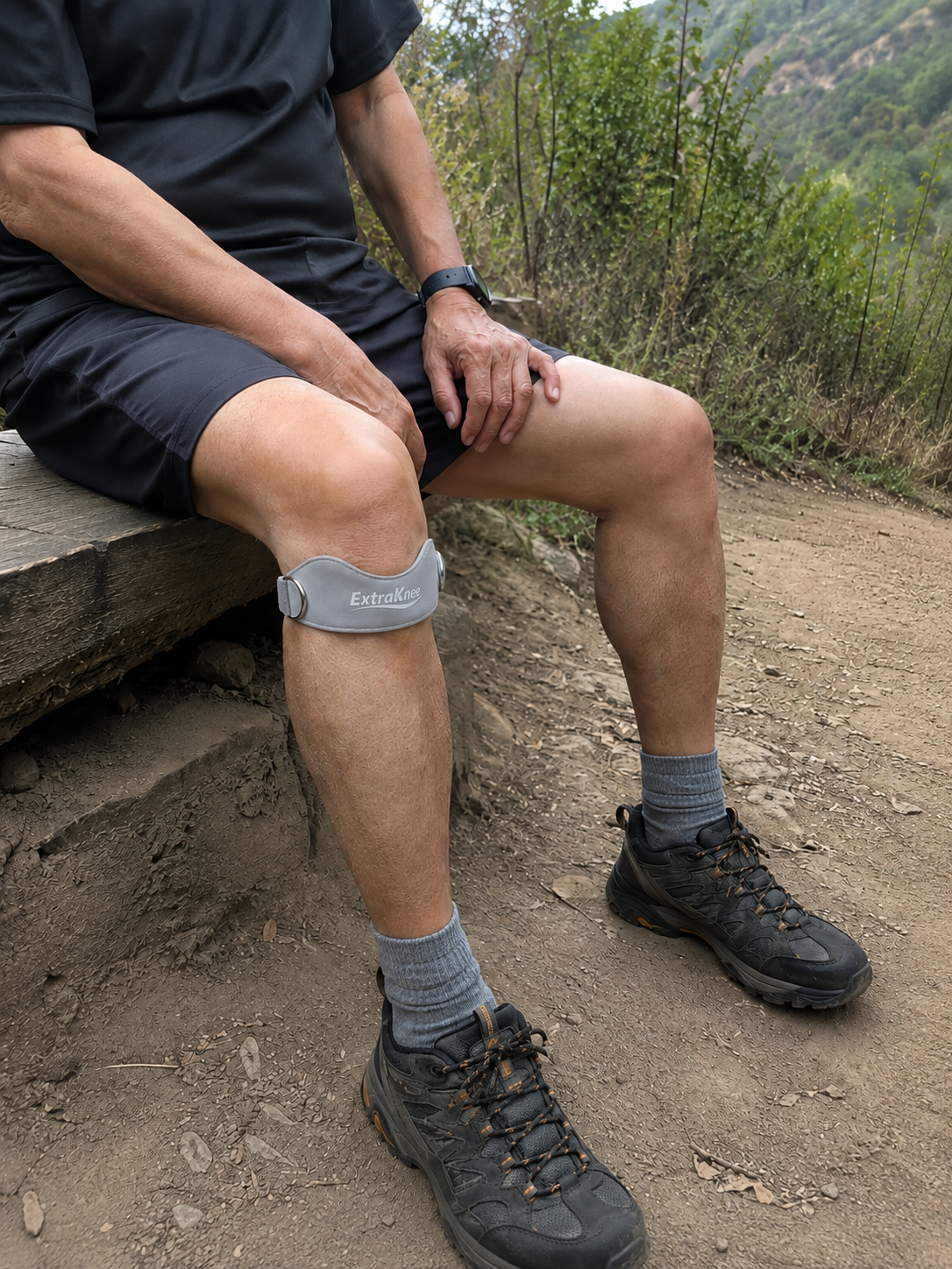 Gray ExtraKnee strap worn while hiking